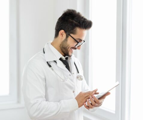Doctor using tablet