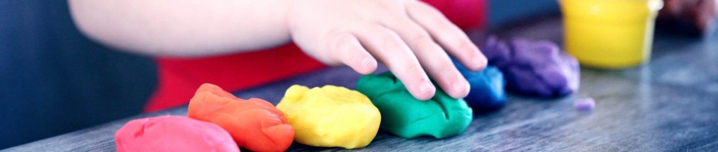Child playing with clay